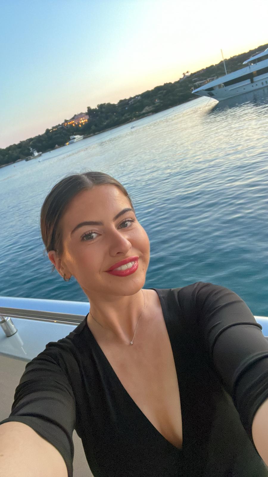 Charlotte working as a stewardess on a yacht